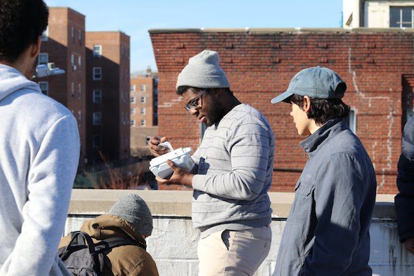 Young adults helping maintain the decentralized Red Hook WiFi network